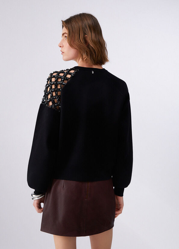 Maglia con ricamo gioiello