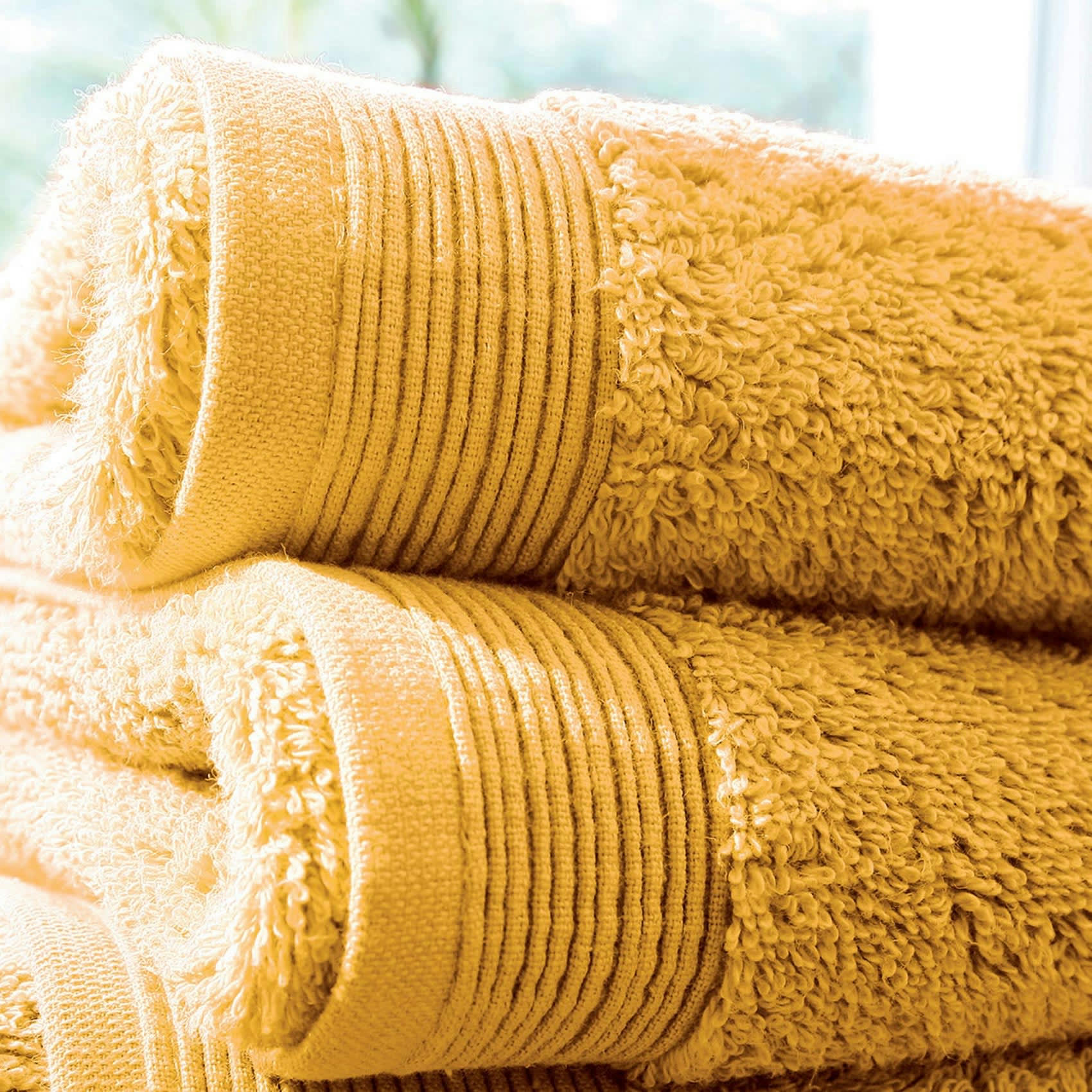 - Lot de 2 serviettes invité en éponge coton jaune ocre 33x50 cm