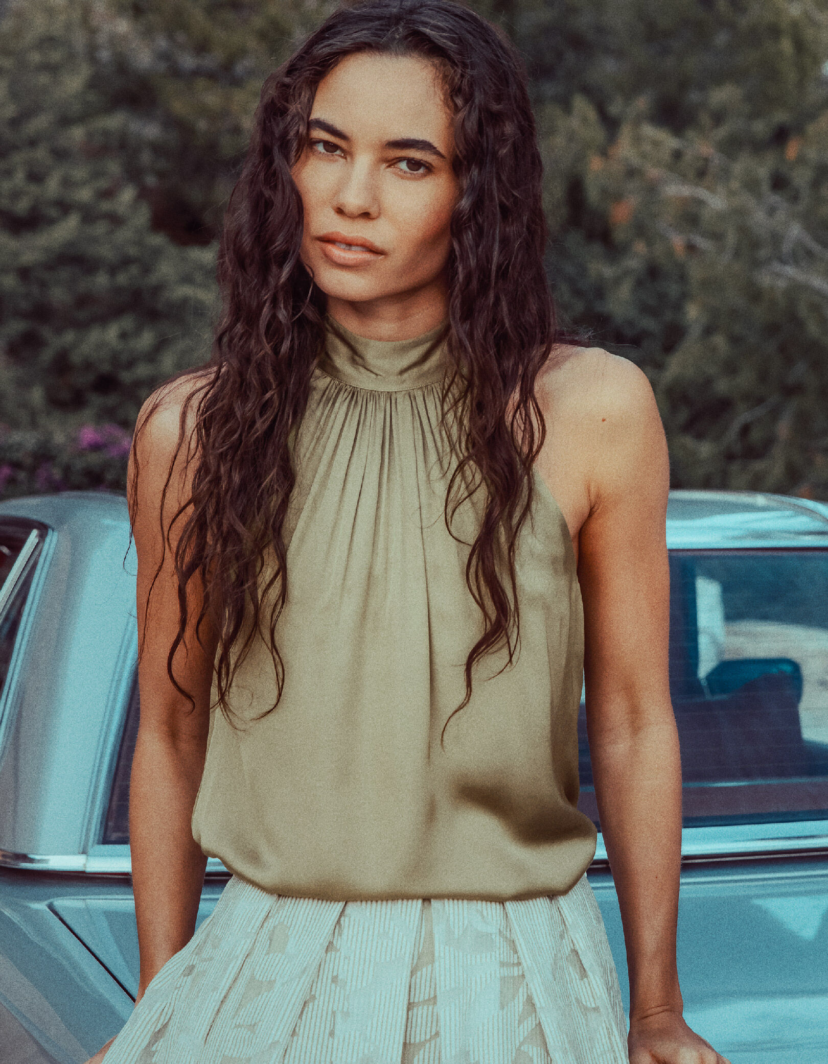 Top sans manches vert satiné Femme