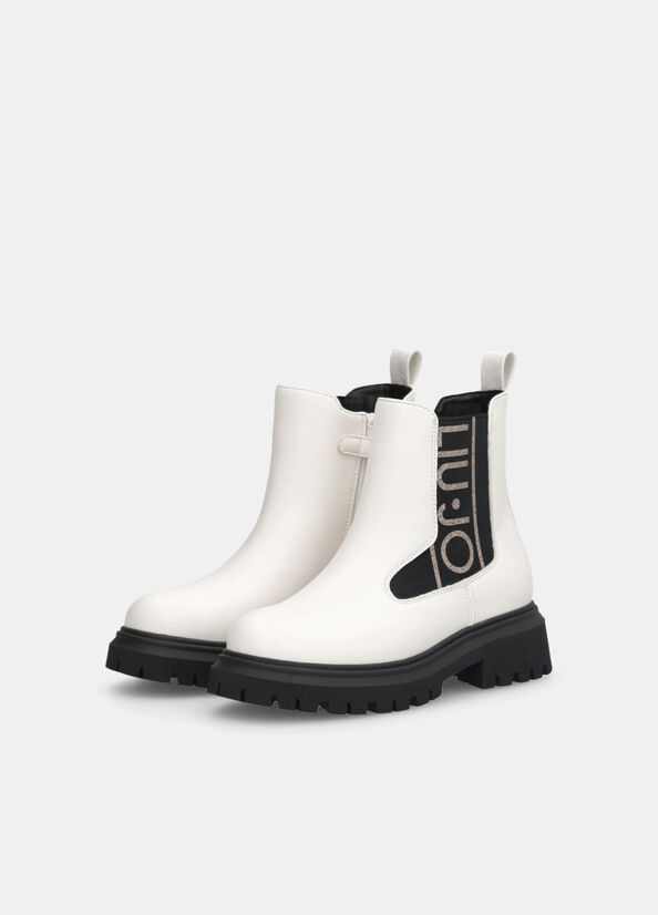 Stivaletti con maxi logo glitter