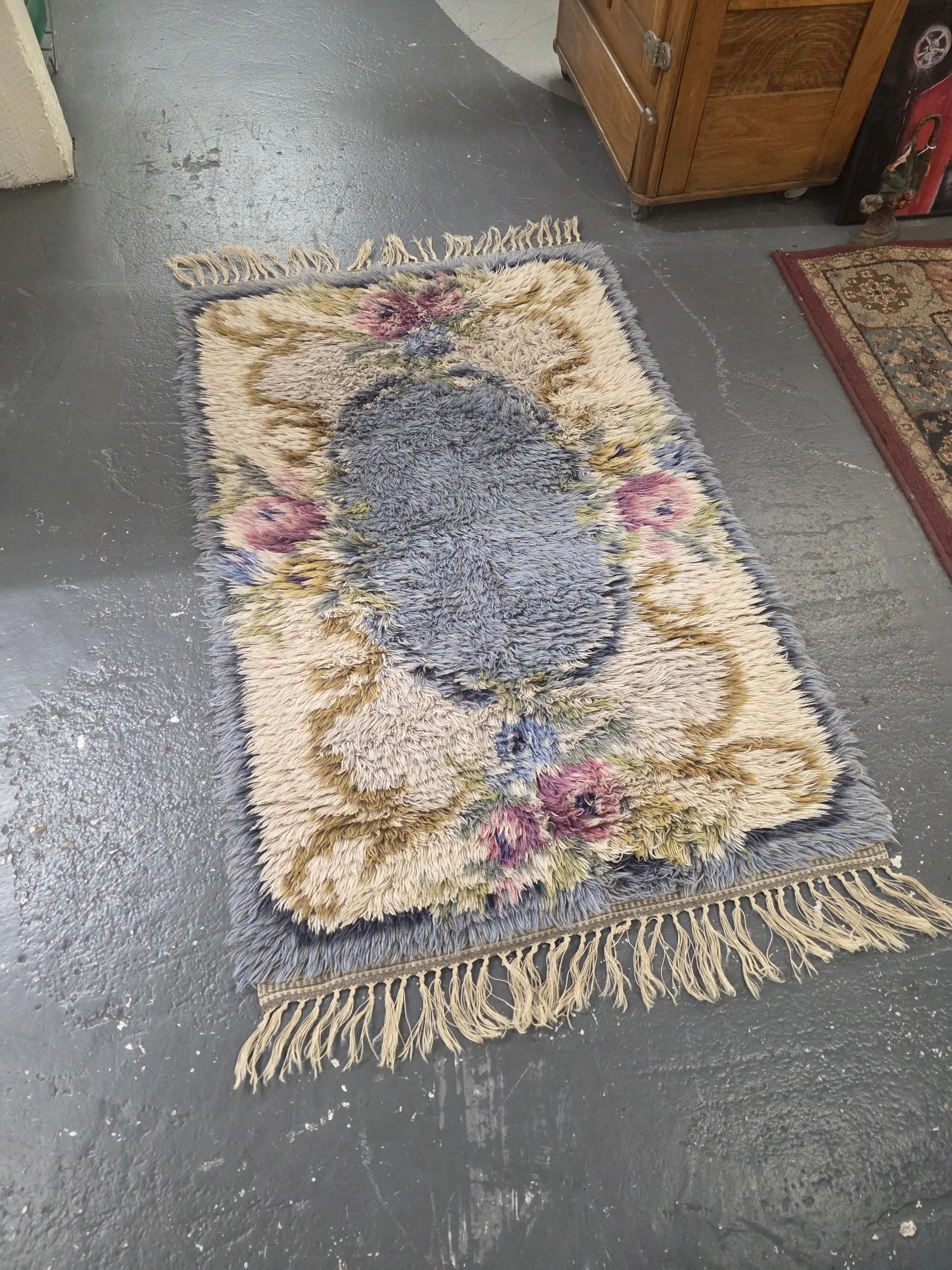 Handmade Made in Sweden, Multi-Colored Rya Rug, Blue and Brown Oval Center, 52 inches by 26 inches, Mid Century, Rare Find
