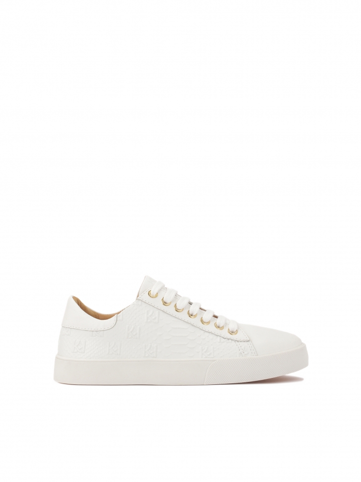 White sneakers with embossed pattern