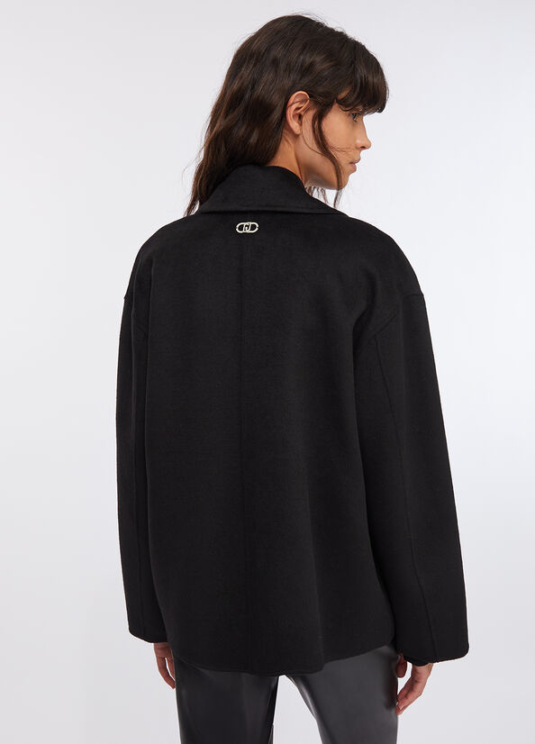 Cappotto in lana con ricami gioiello
