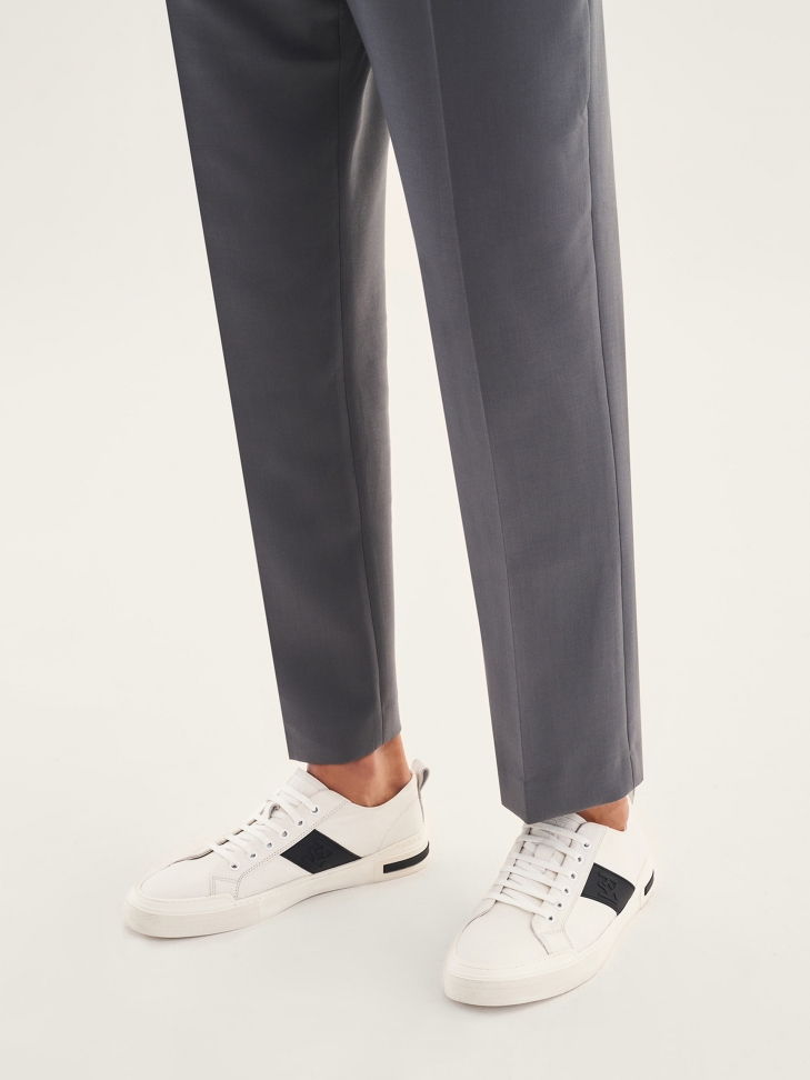 Men’s off-white sneakers with black inserts