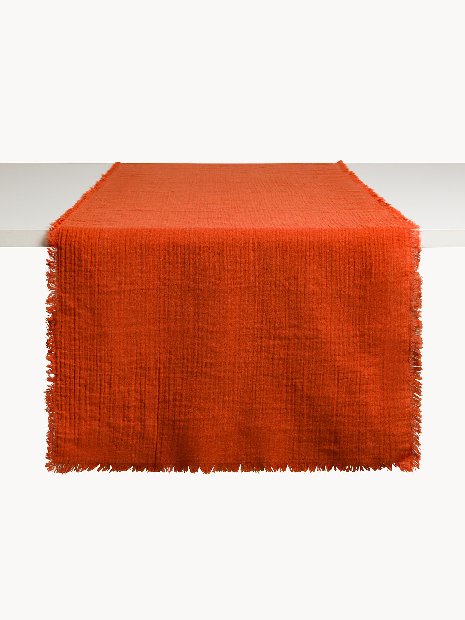 Runner in mussola di puro cotone con frangette