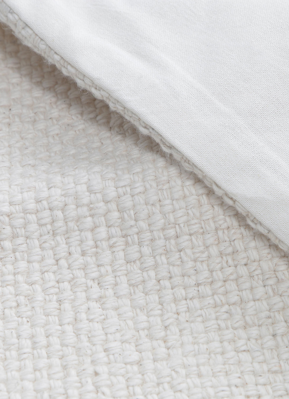 HOUSSE DE COUSSIN UNIE AVEC TISSAGE FANTAISIE ECRU