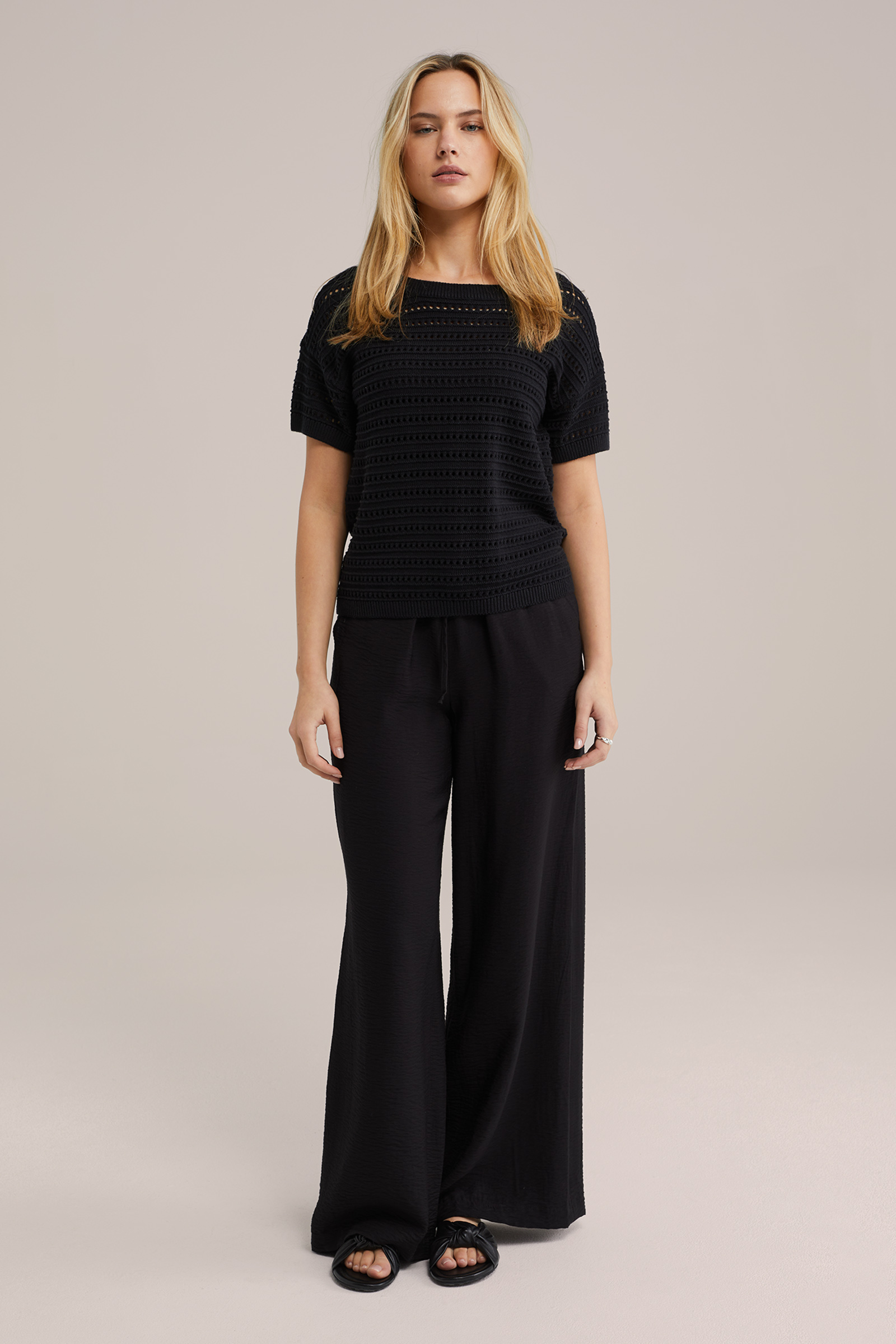 Dames gebreide trui met opengewerkte structuur