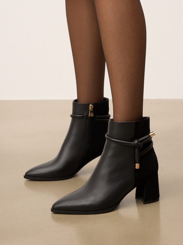 Black suede and smooth leather boots