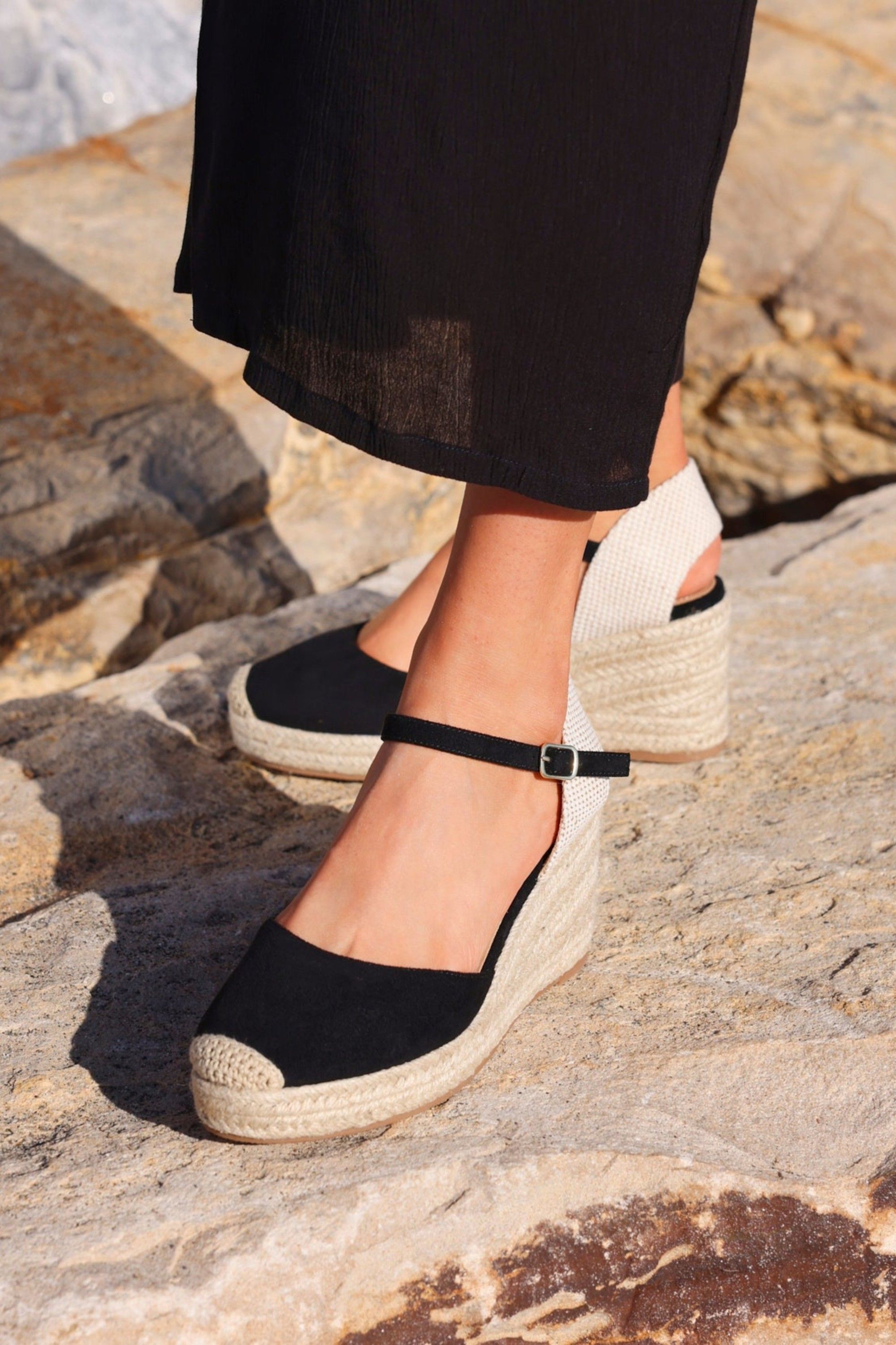 Linzi Present Black Closed Toe Wedges