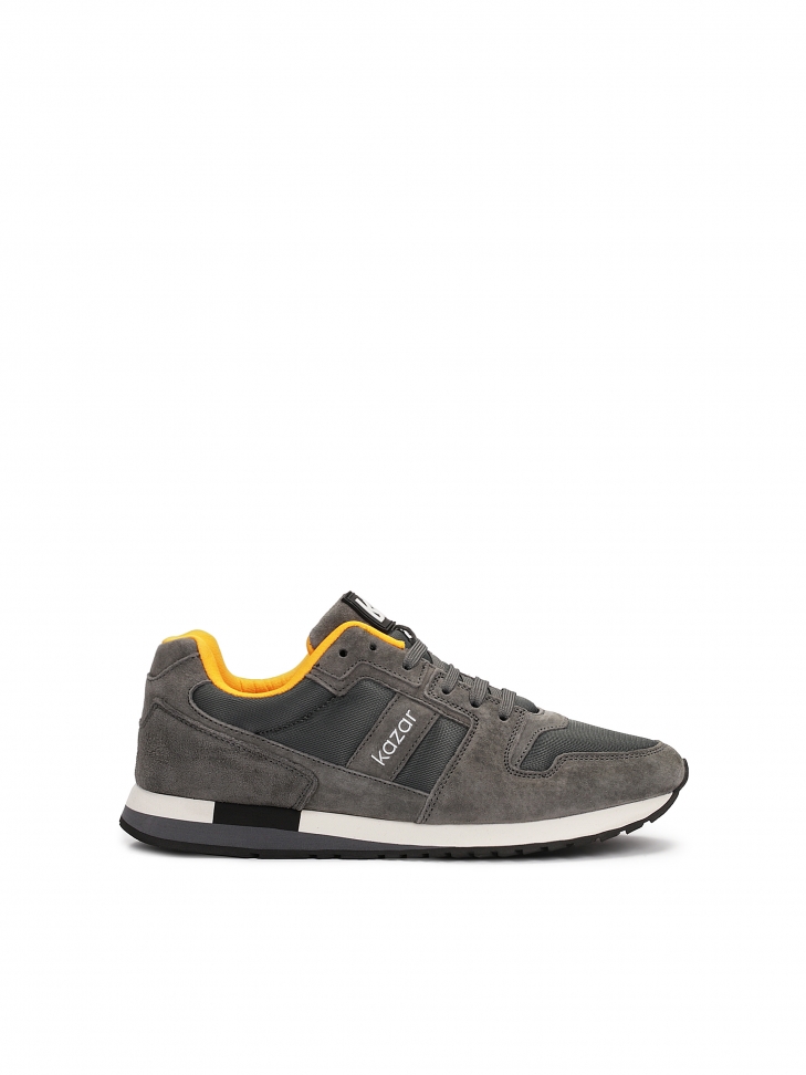 Grey suede sneakers with yellow elements
