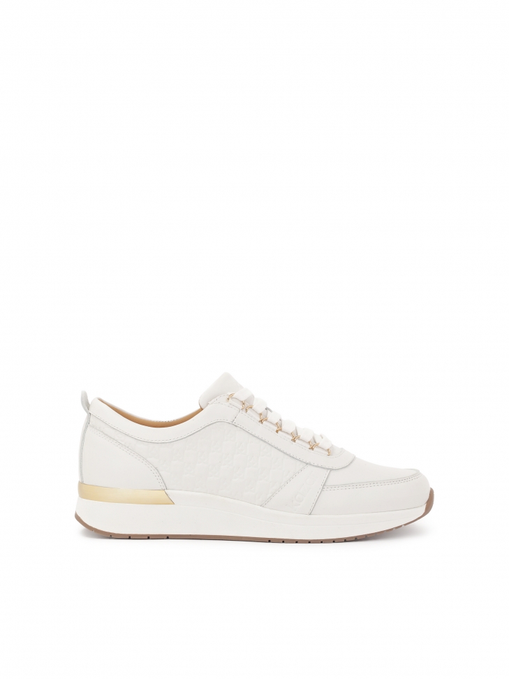 White sneakers on a raised sole