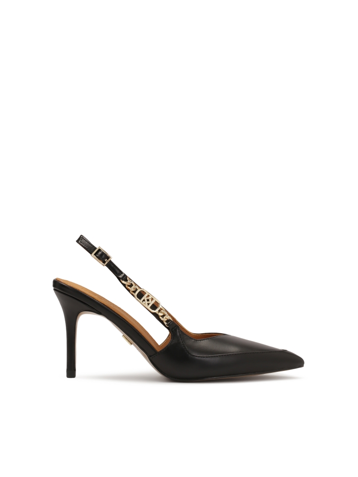 Black slingback pumps with metal monogram