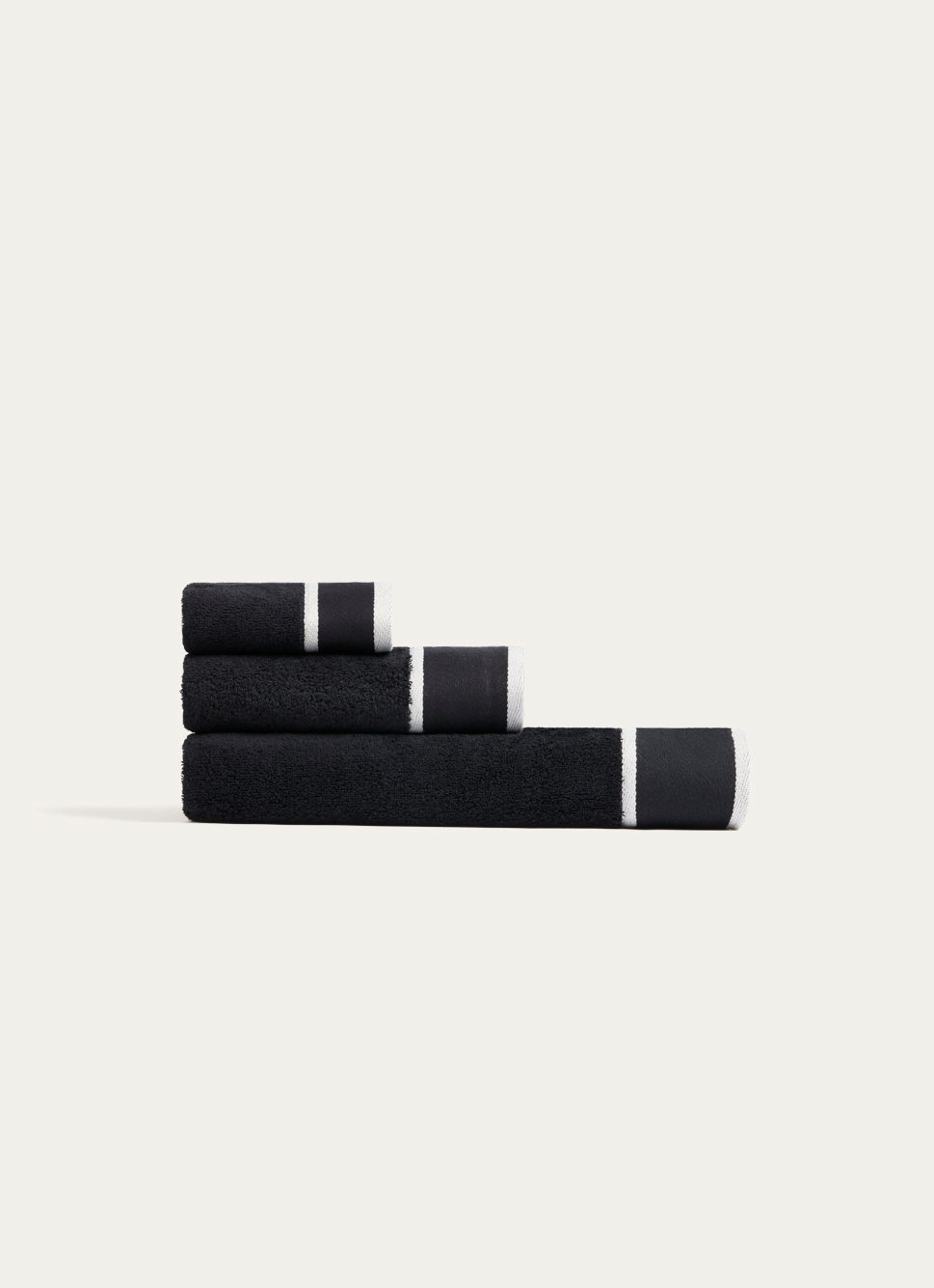SERVIETTE DE TOILETTE UNIE à LARGE BORDURE ARTHUR NOIR