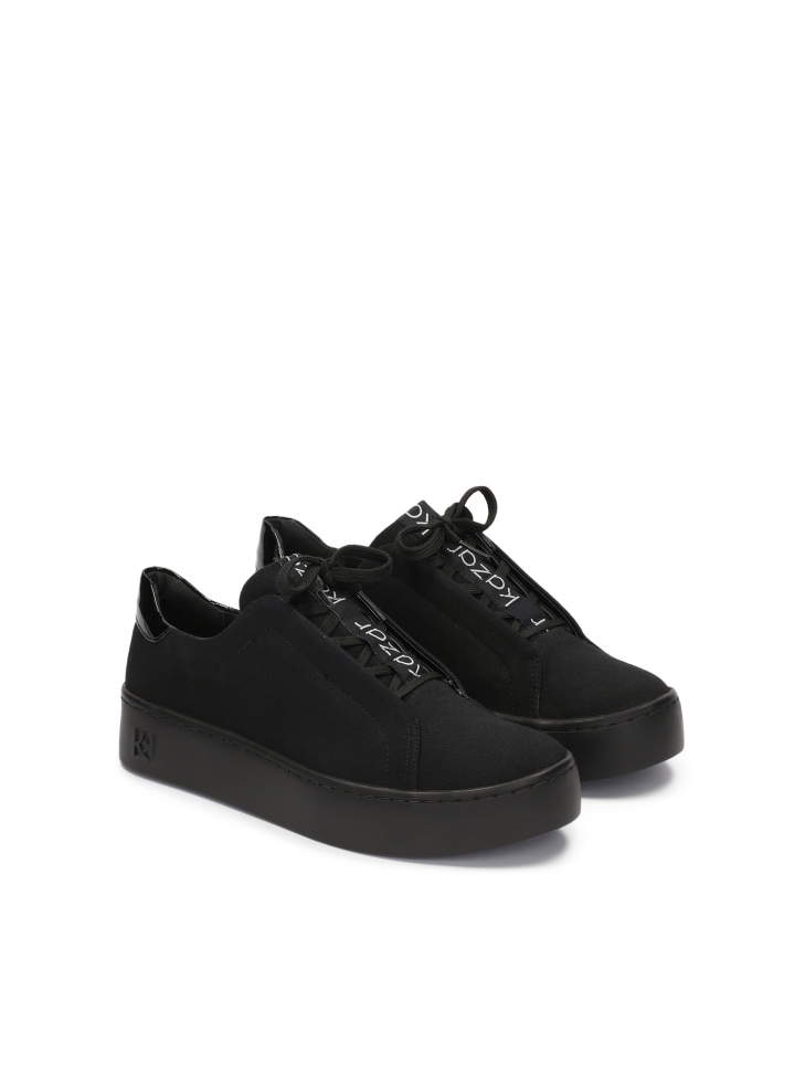 Ladies’ black sneakers with attractive lacing