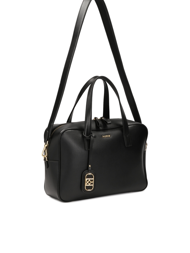 Leather handbag with a geometric shape