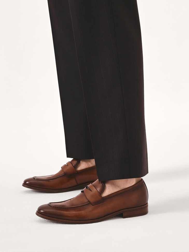 Leather loafers with cross strap