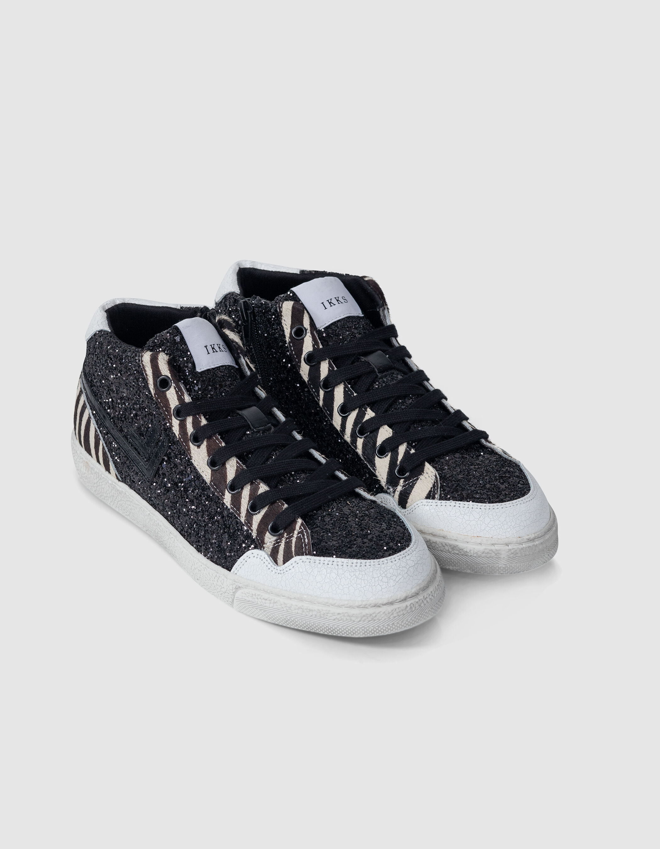 Baskets noires micro sequins et cuir motif zèbre Femme