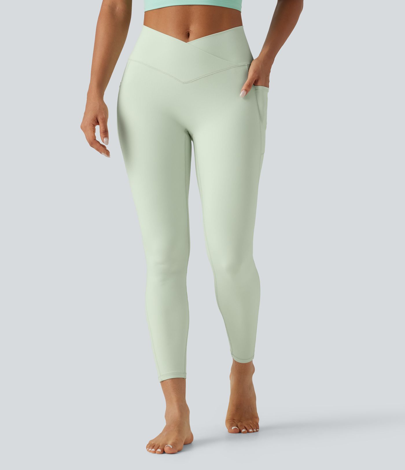 Legging de yoga SoftlyZero™ taille haute croisée uni avec poches et protection solaire UPF50