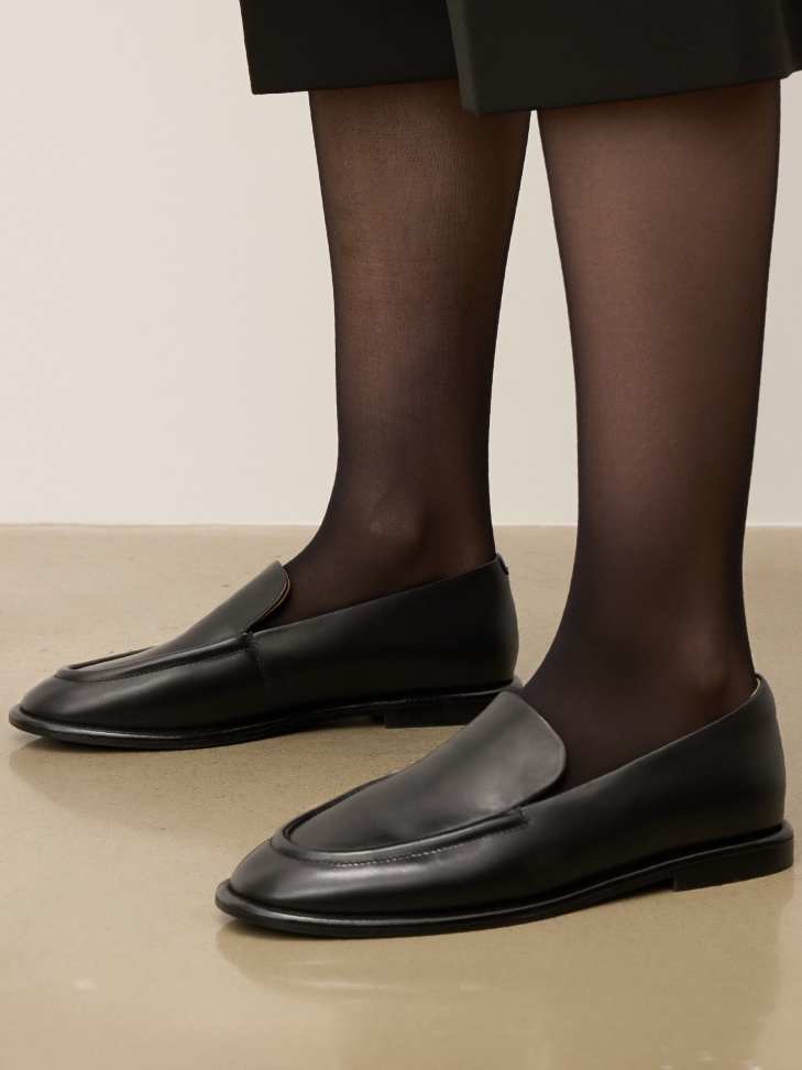 Black loafers made of natural leather