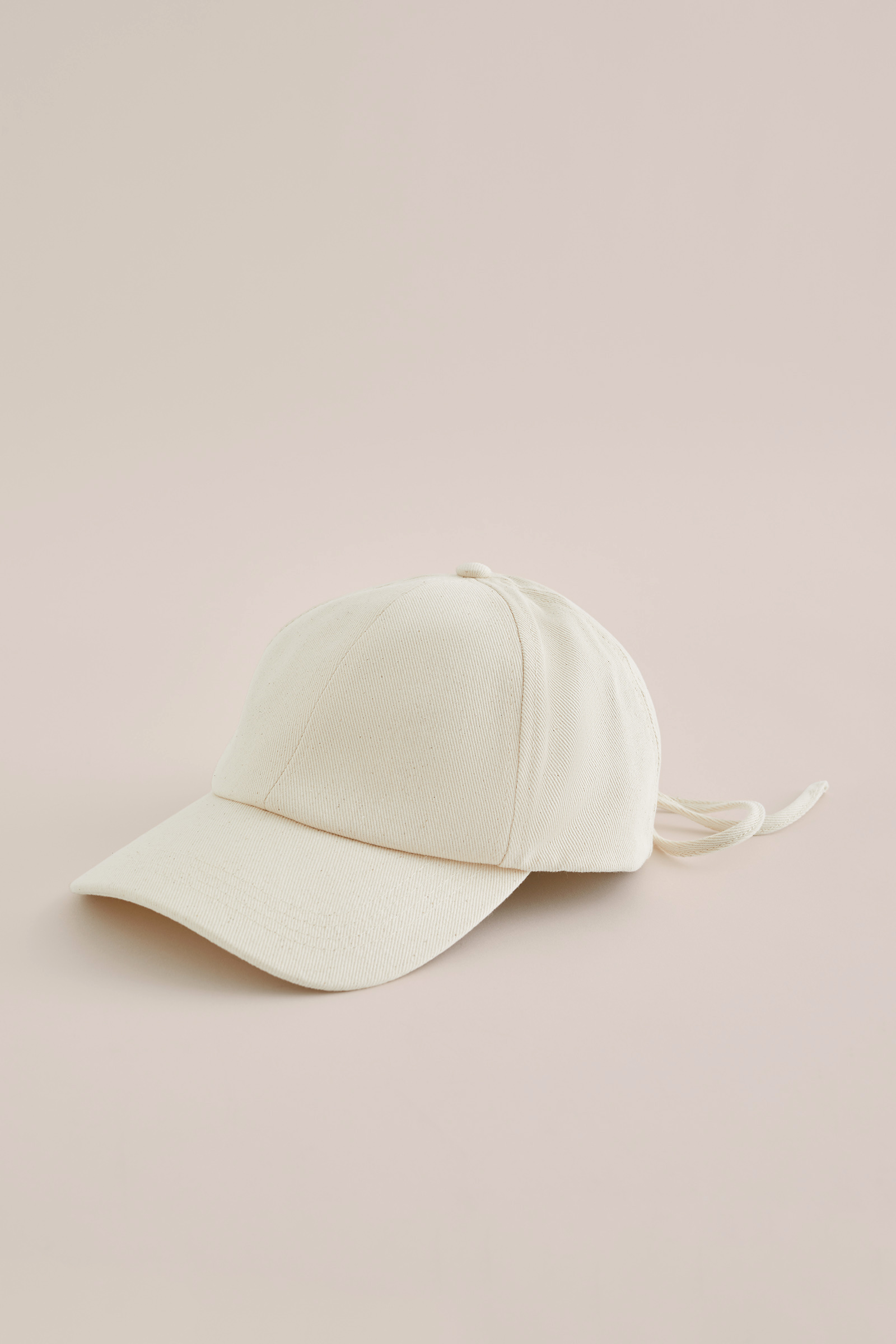 Dames pet met strikdetail