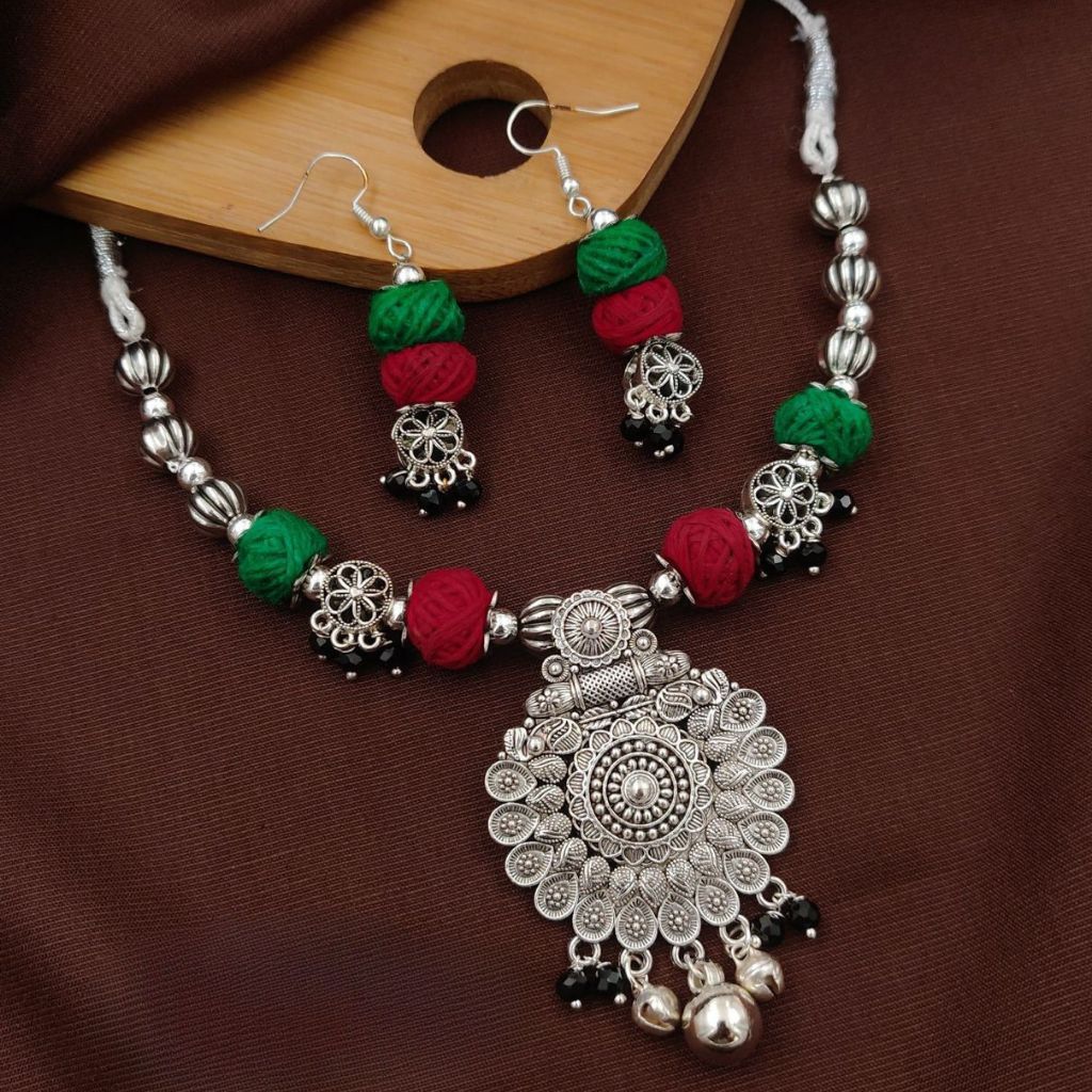 The Colourful Aura Handcrafted Silver Oxidized Necklace Set with Red & Green Beads