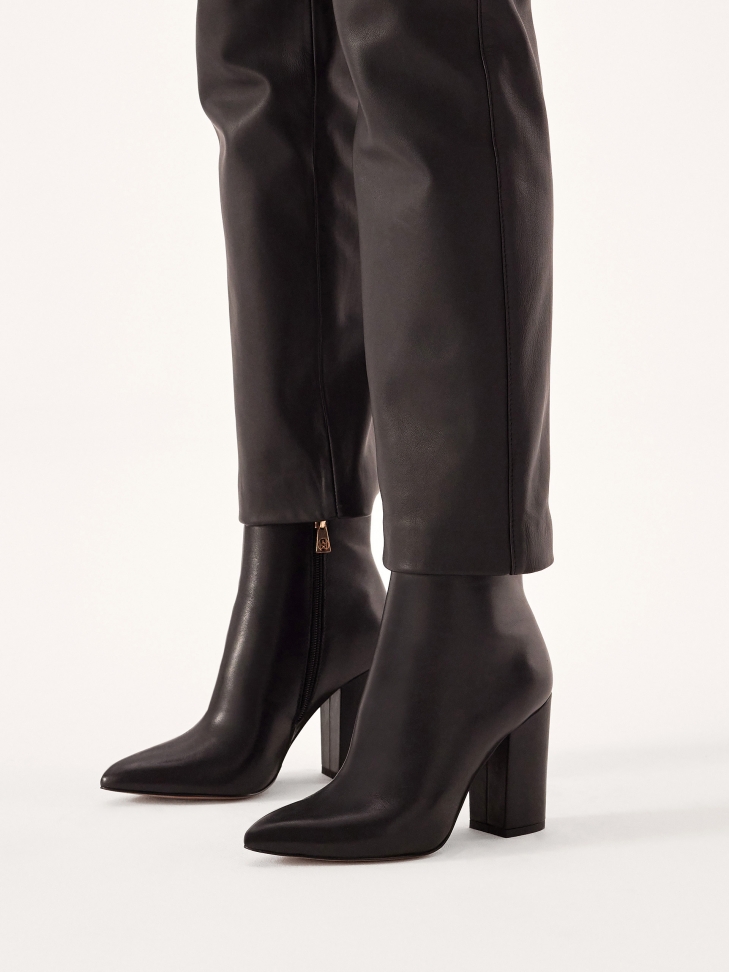 Stiletto leather boots with matching upper