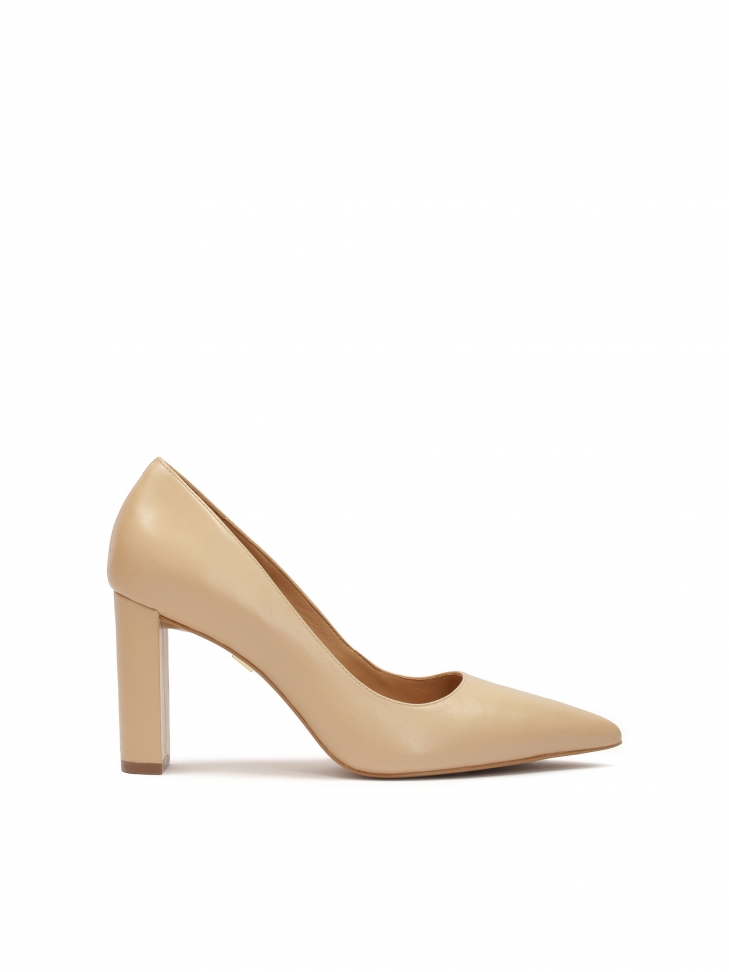Beige pumps on a narrow post