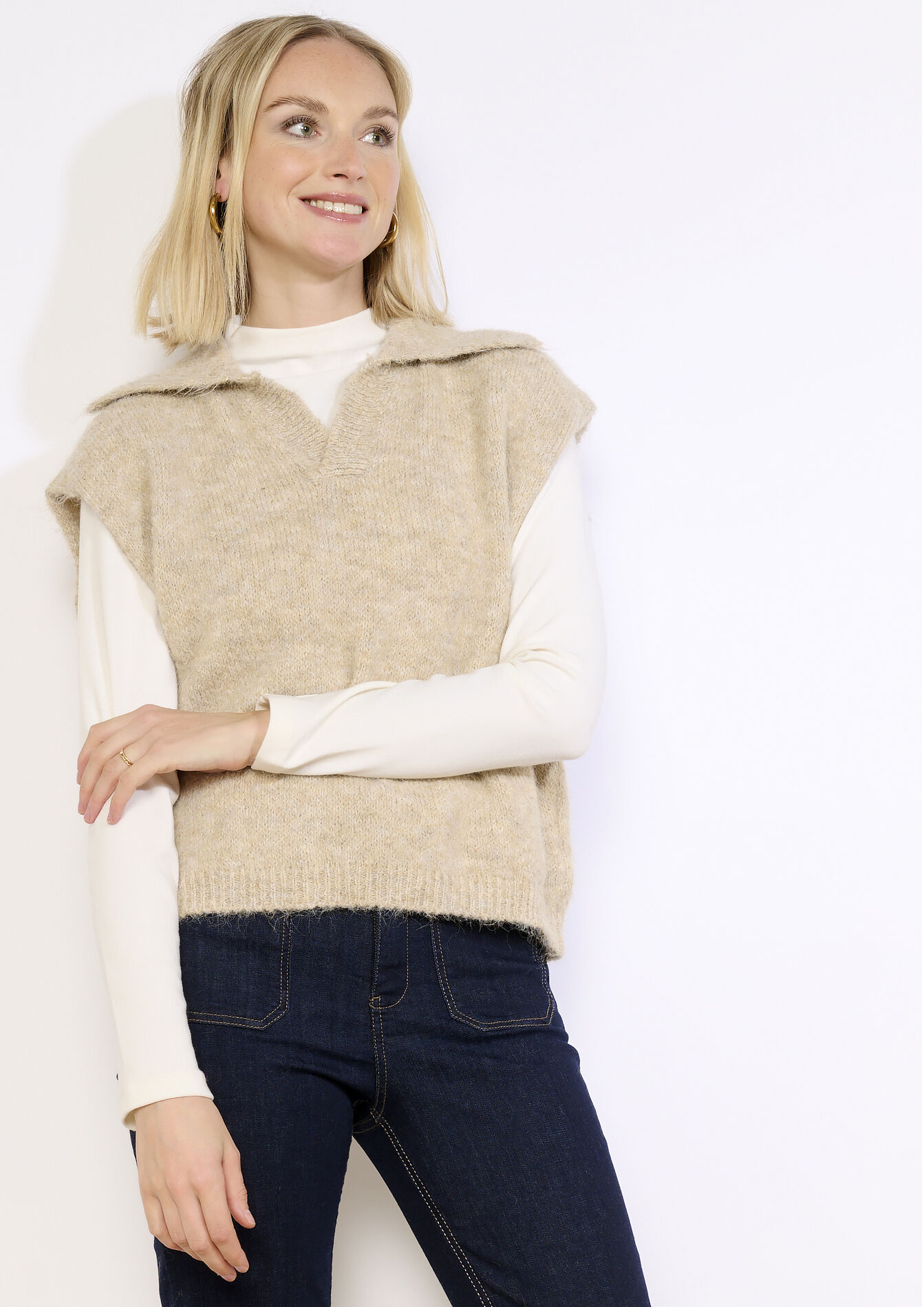 Mouwloze trui met polokraag