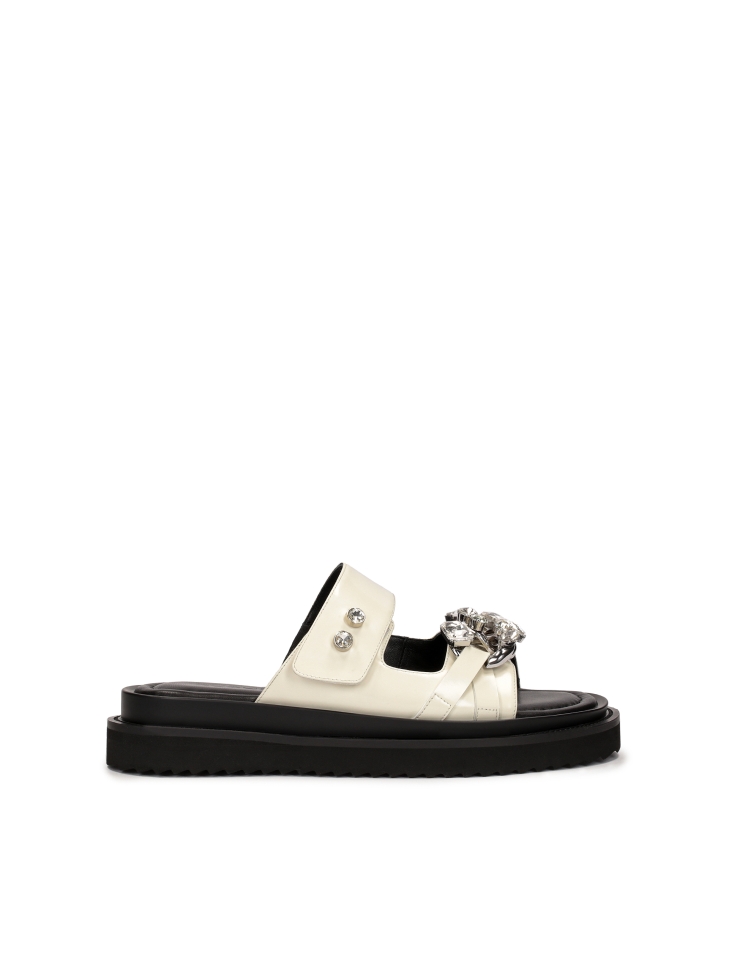 Flat leather slides with elegant decoration