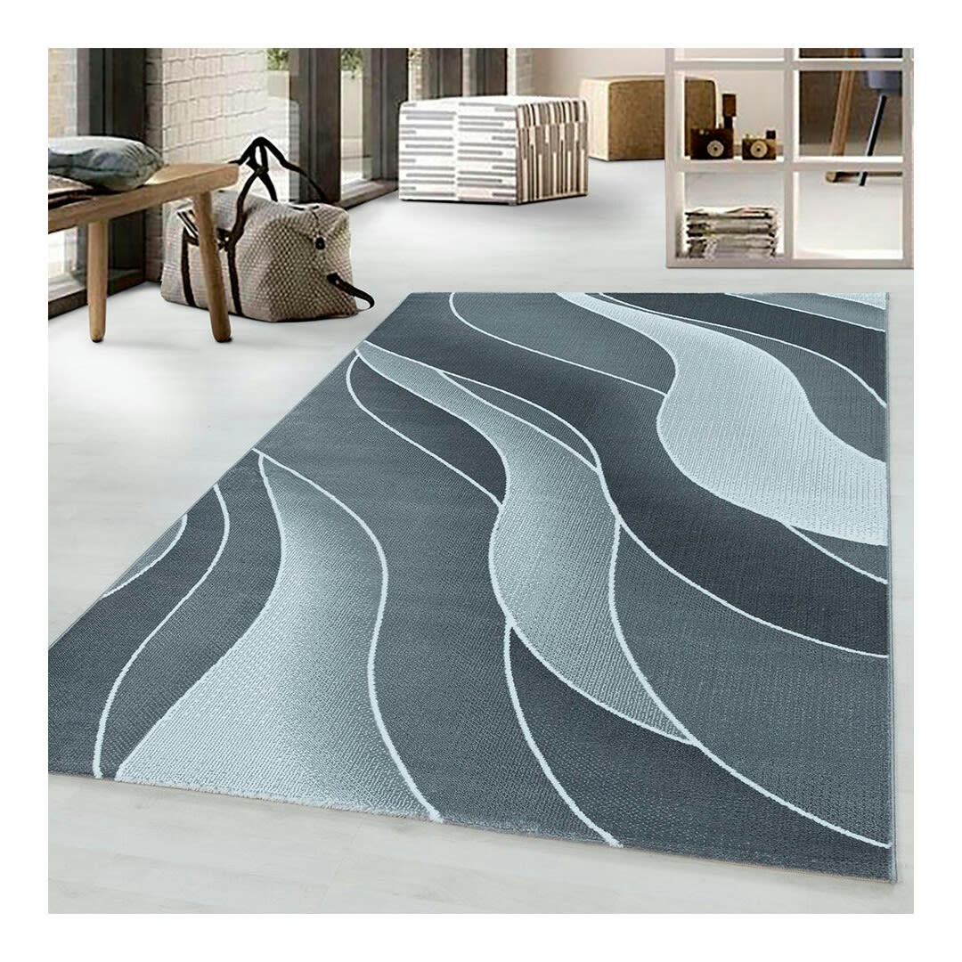 CHOUETTE - Tapis courbe design en polypropylène gris 140x200