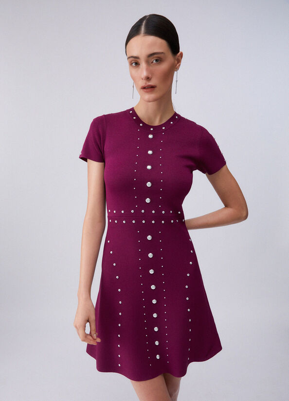 Abito in maglia con borchie