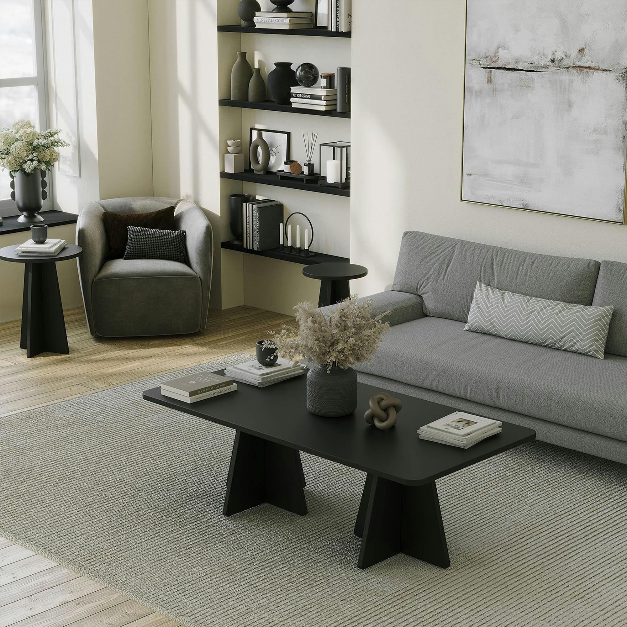 Table basse noire design avec pieds trapèze MARFA