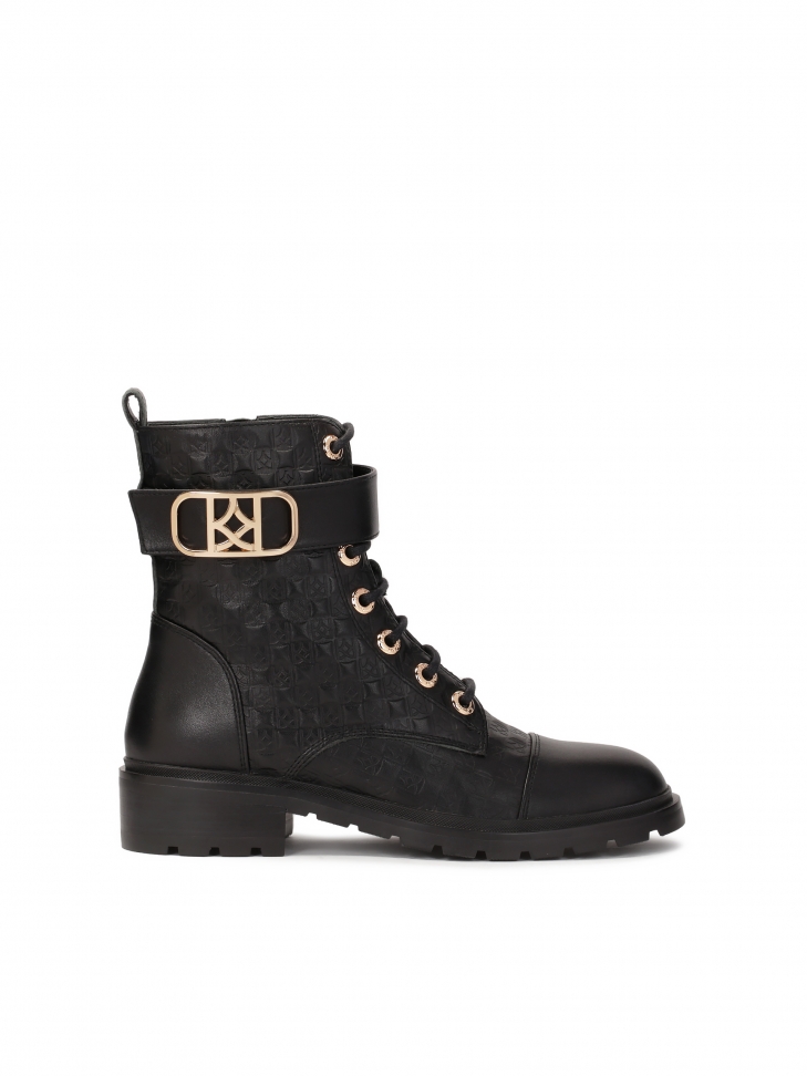 Leather boots decorated with embossed pattern