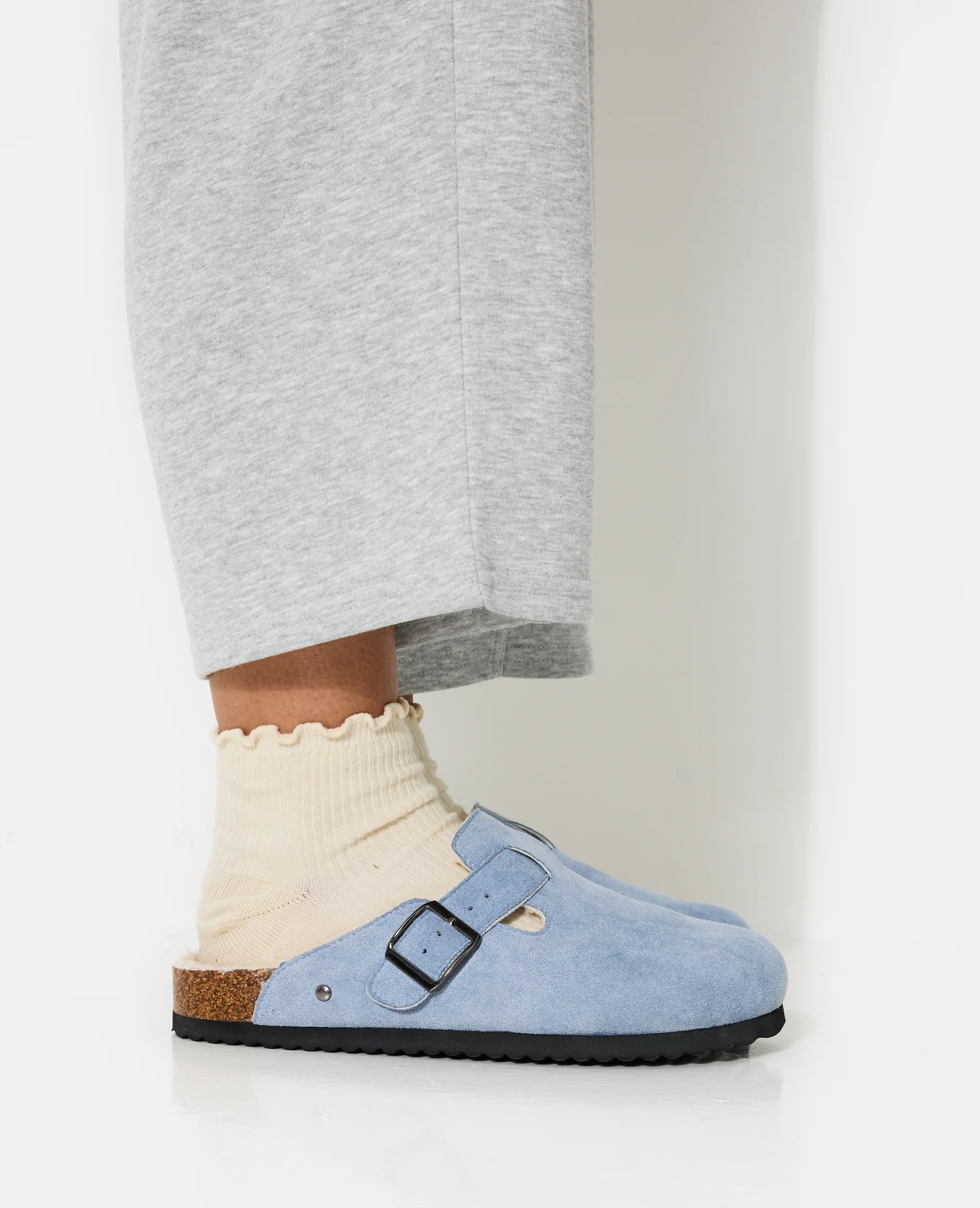 Mules sabots en suédine avec bride et sherpa