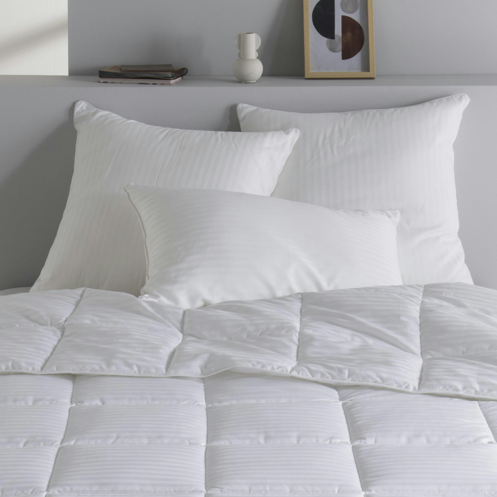 - Oreiller ferme en 100% coton blanc 50x75 cm