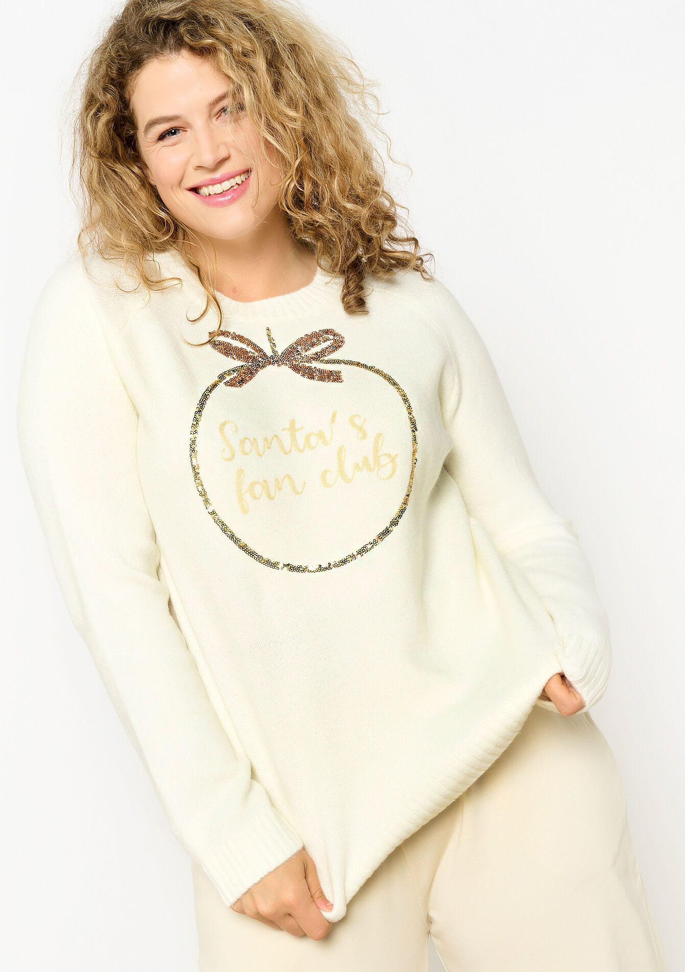 Trui met pailletten en opschrift