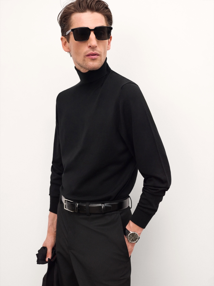 Timeless watch on a leather black strap