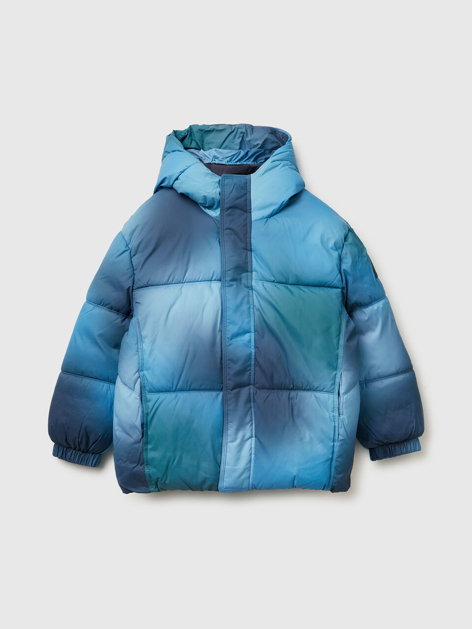 Padded jacket in shaded nylon