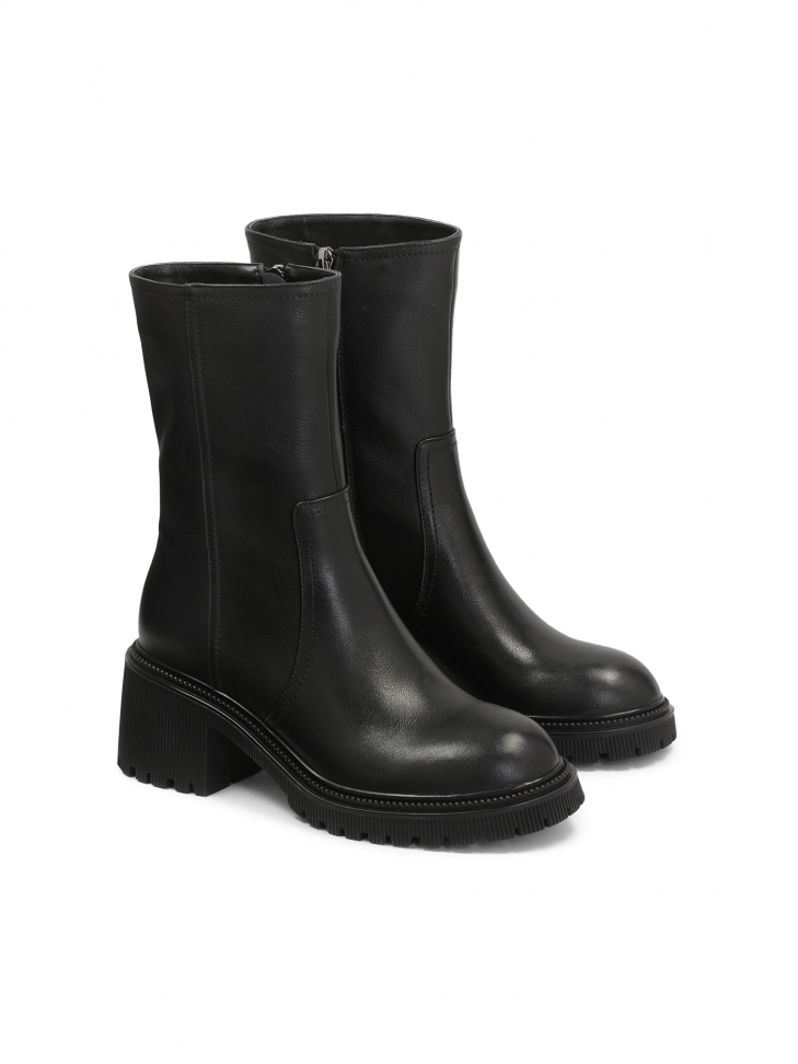 Leather booties with a tall upper and a wide heel with a protector