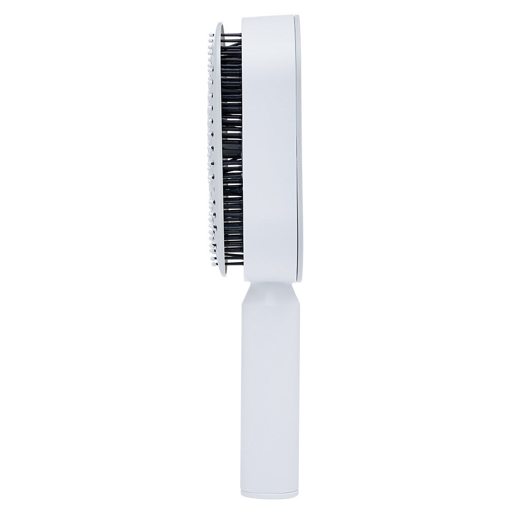 Brosse à cheveux autonettoyante