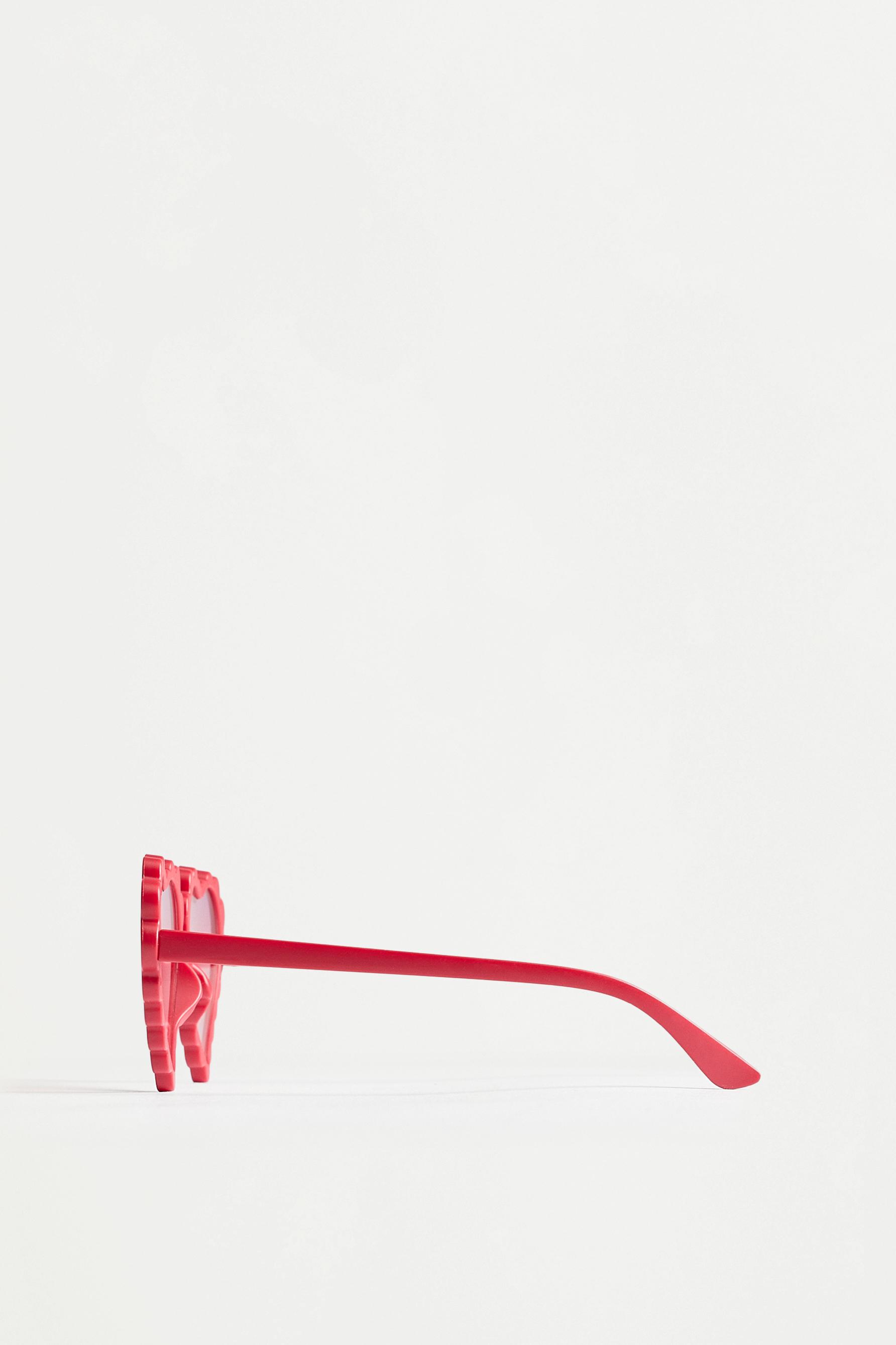 Gafas corazón ondas