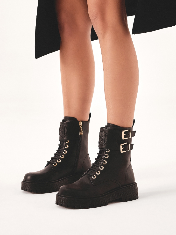 High boots with decorative flap