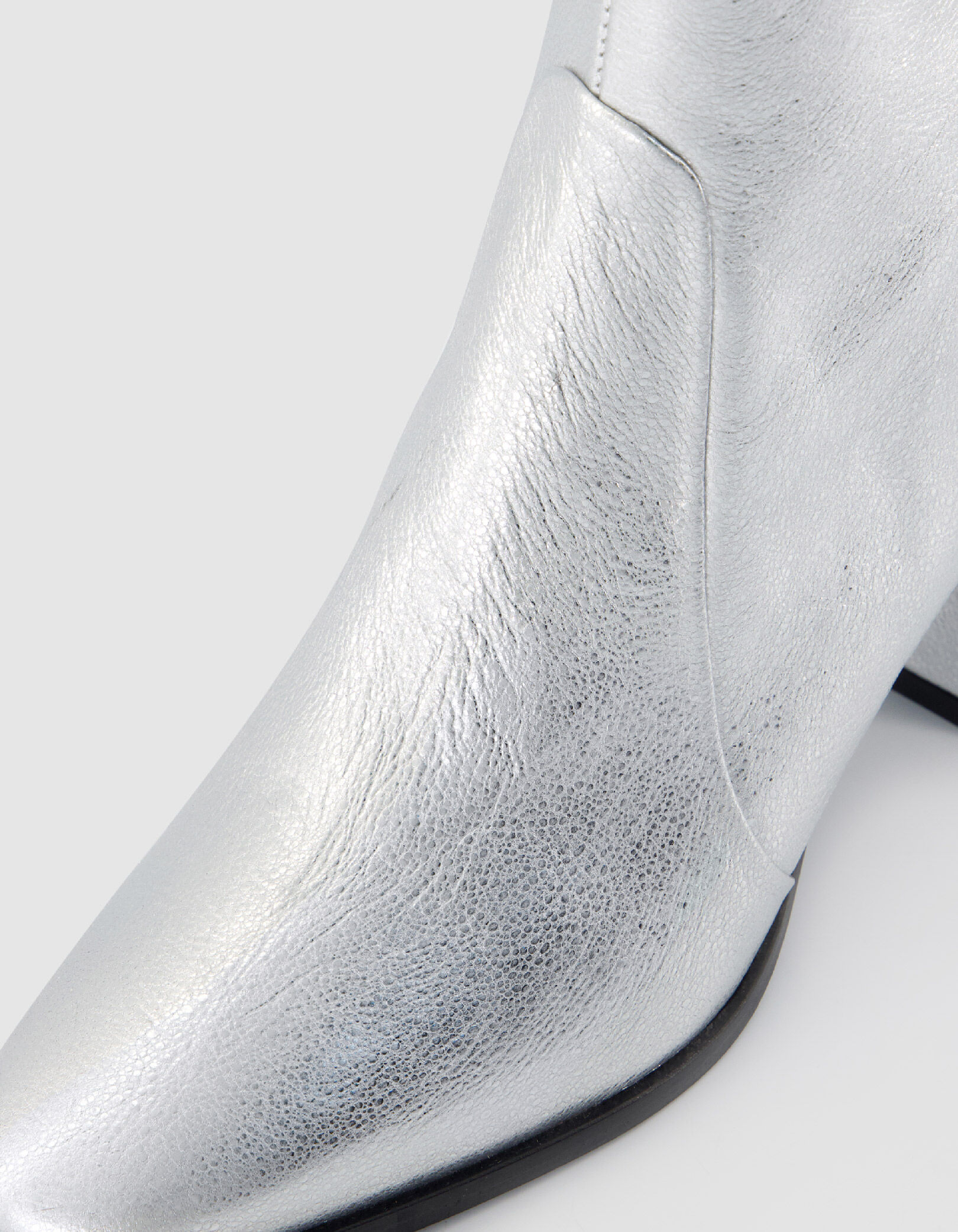 Boots à talon argentées cuir zippées Femme
