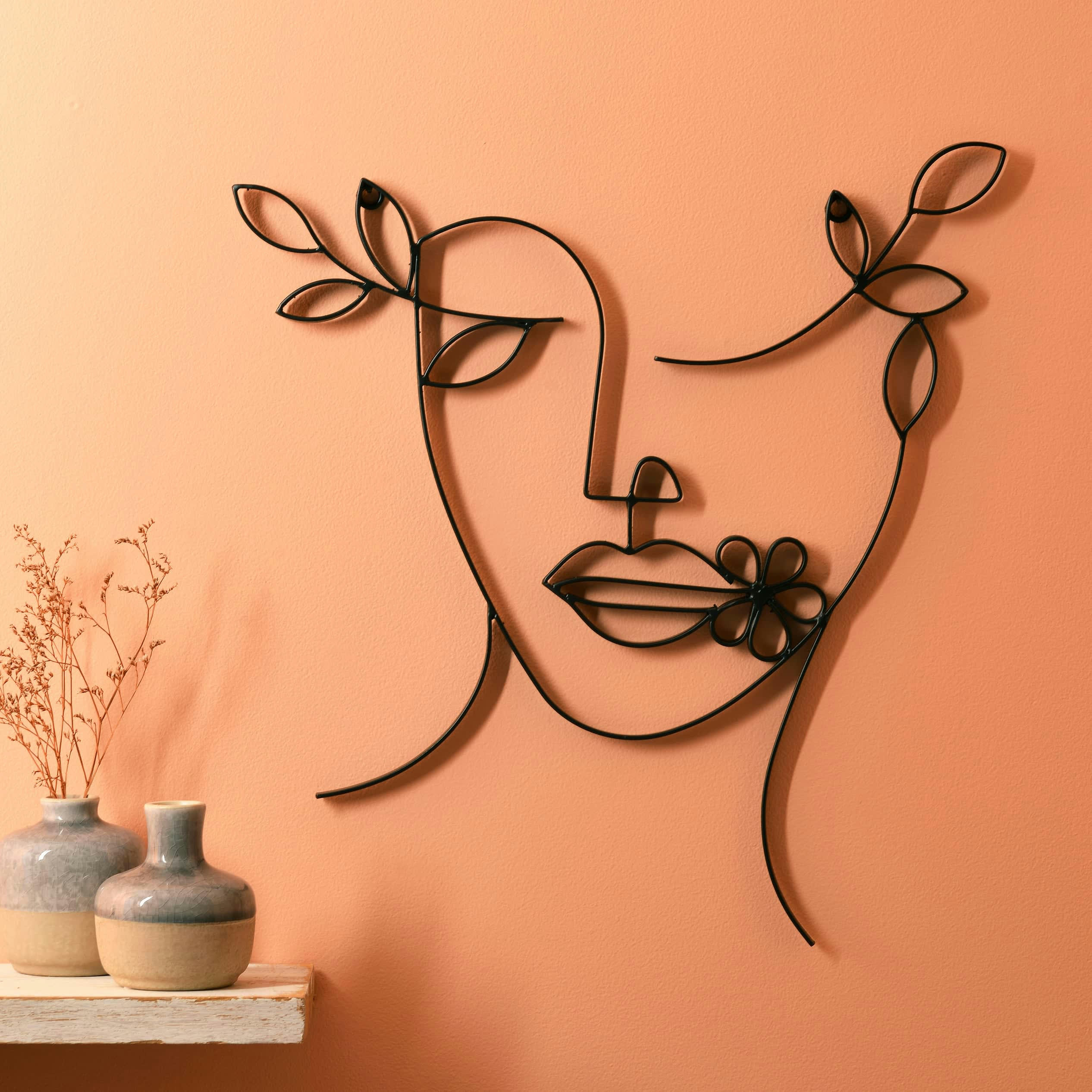 FLORETTE - Plaque décorative visage en métal noir