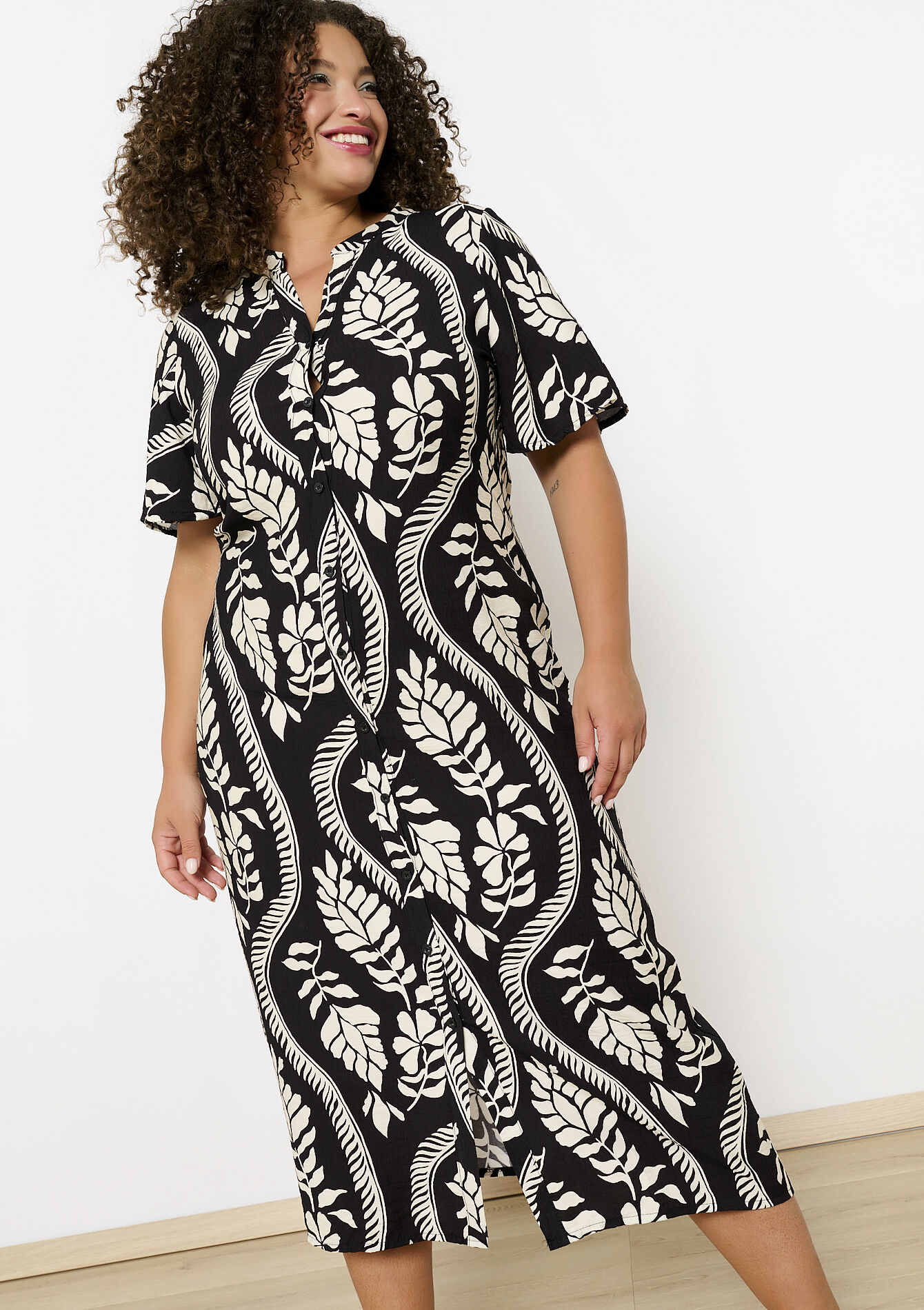 Losvallende overhemdjurk met print