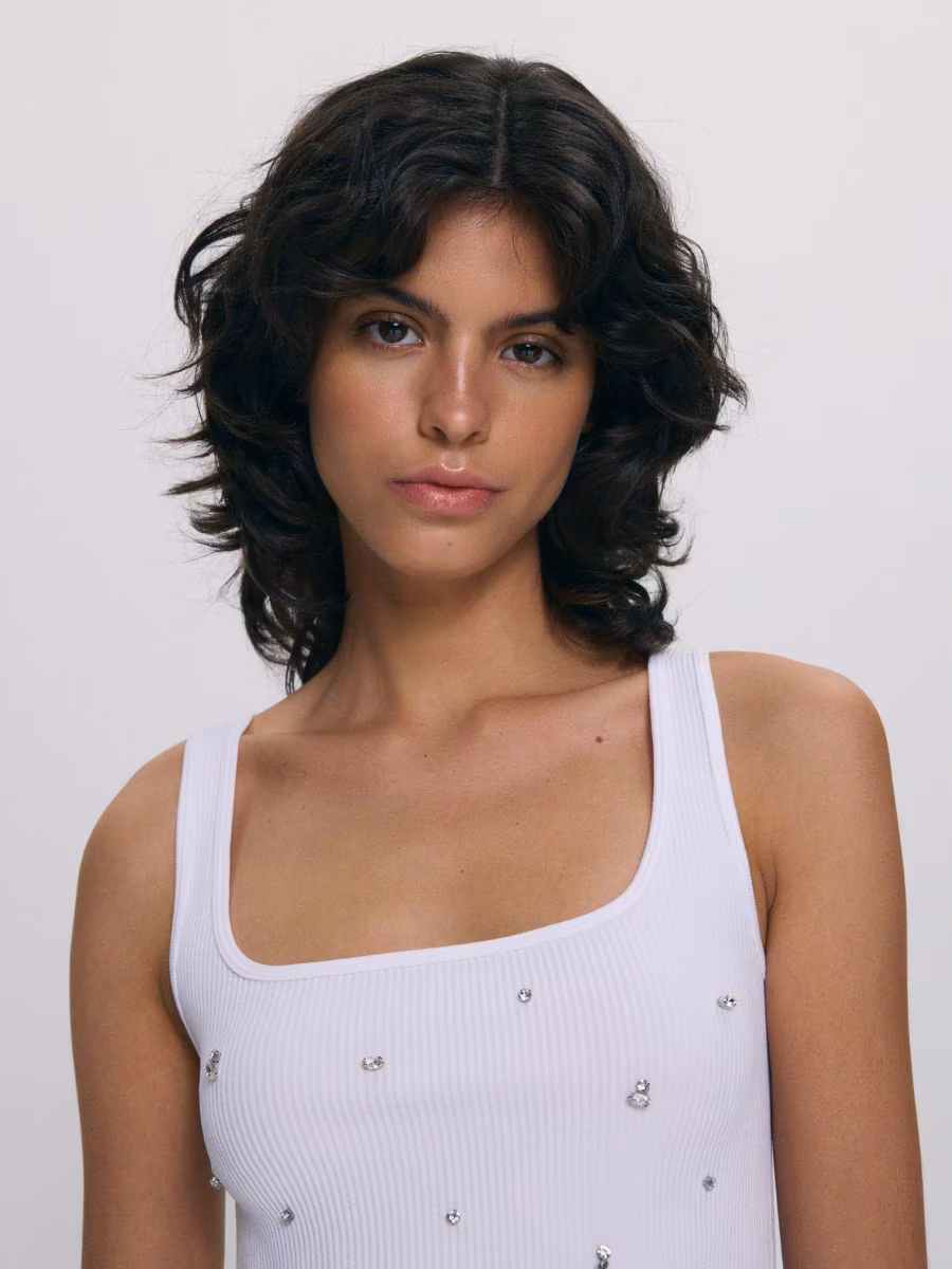 Top With A Decorative Appliqu&eacute;