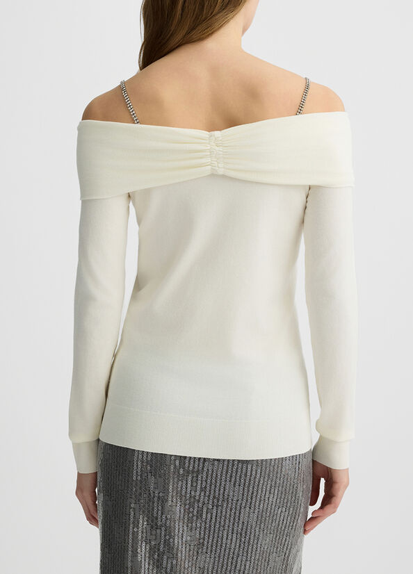 Maglia con scollo bardot e pietre gioiello