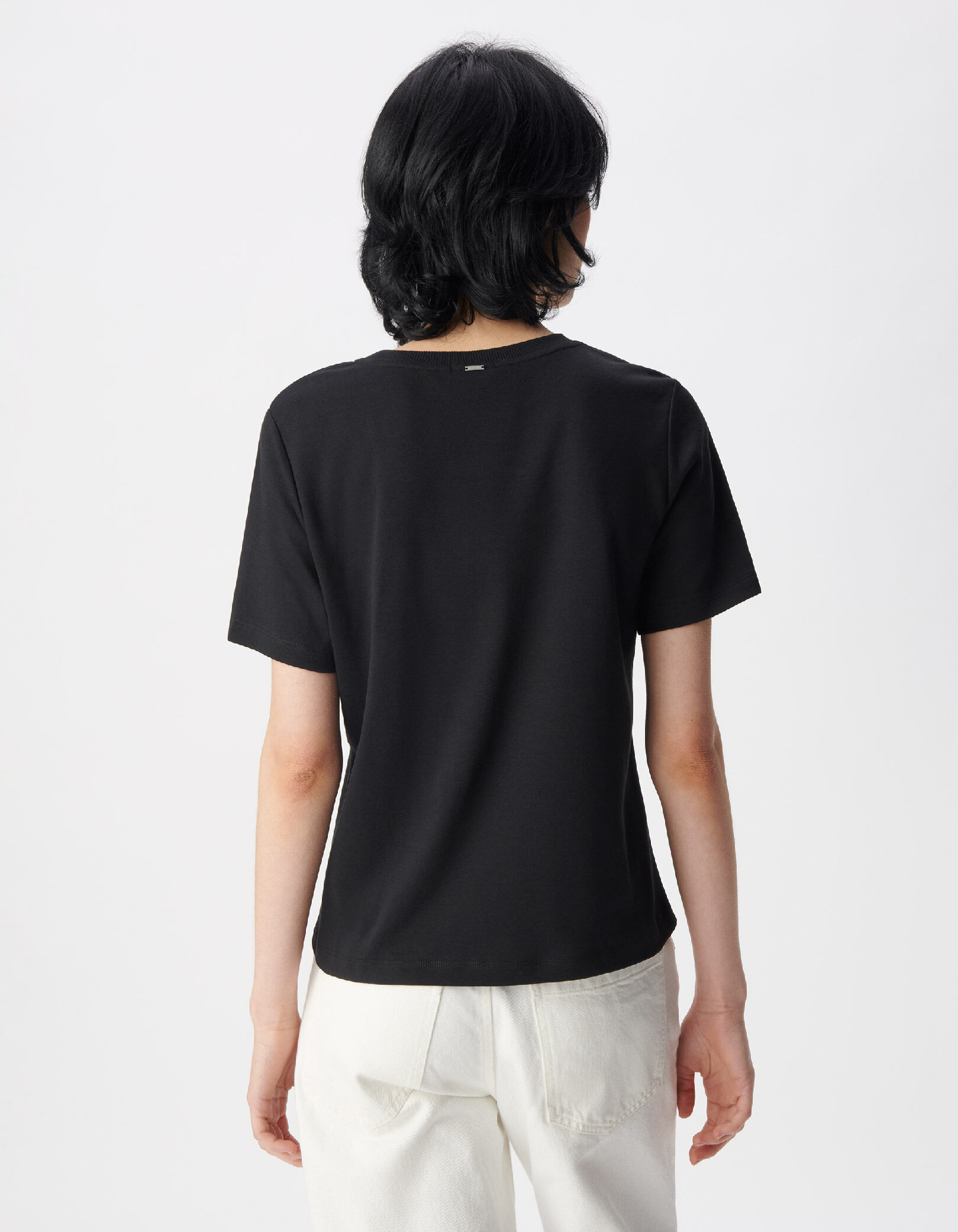 Tee-shirt manches courtes noir motif cœur clouté Femme