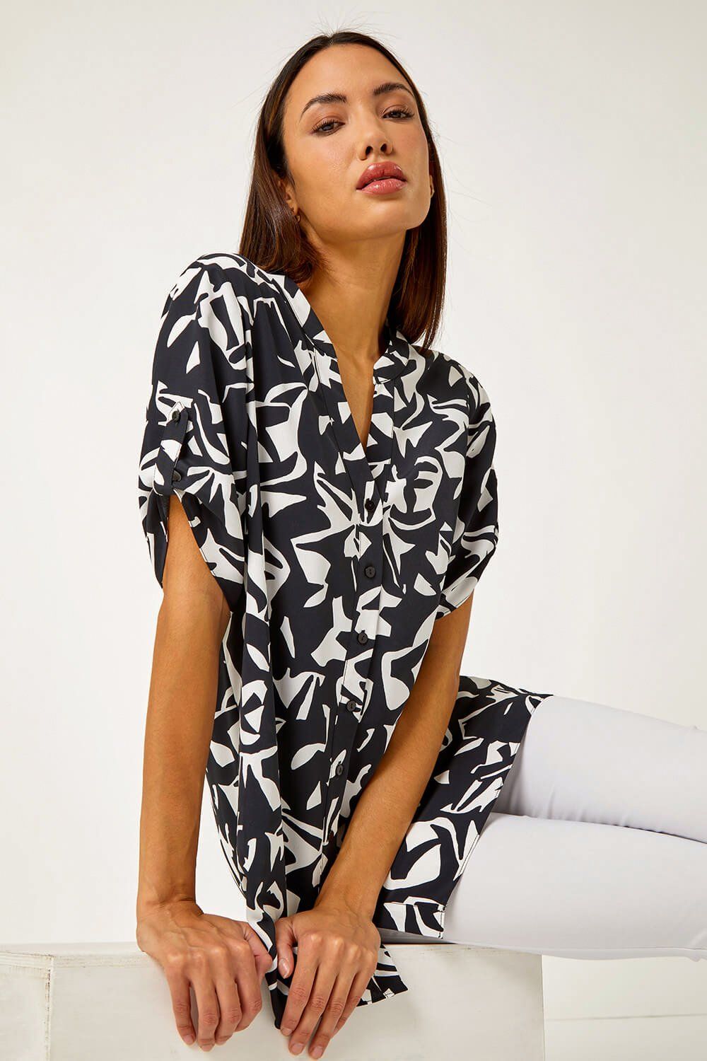 Roman Abstract Print Dipped Hem Shirt