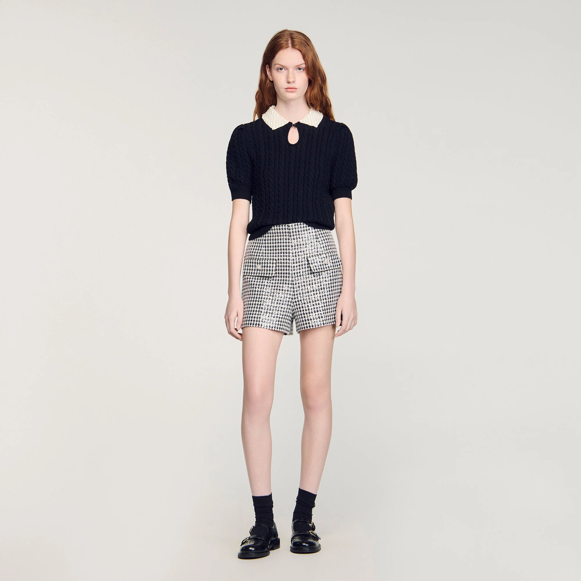 Pull en maille torsadée col perlé